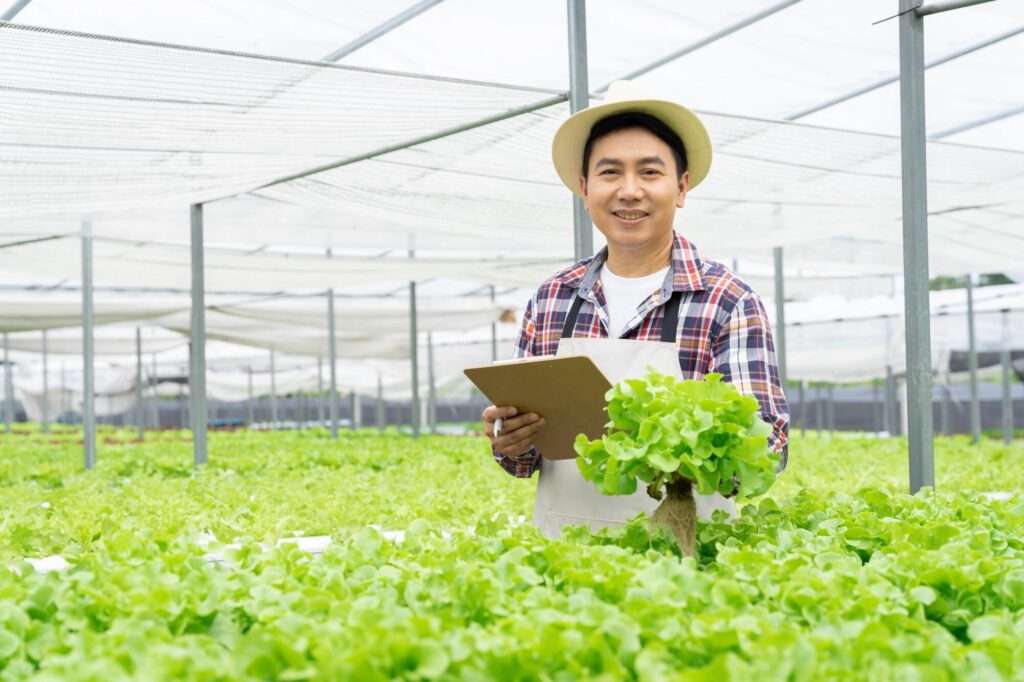 asian-man-picking-vegetables-happy-inspecting-your-2025-03-18-15-00-07-utcResized-1.jpg